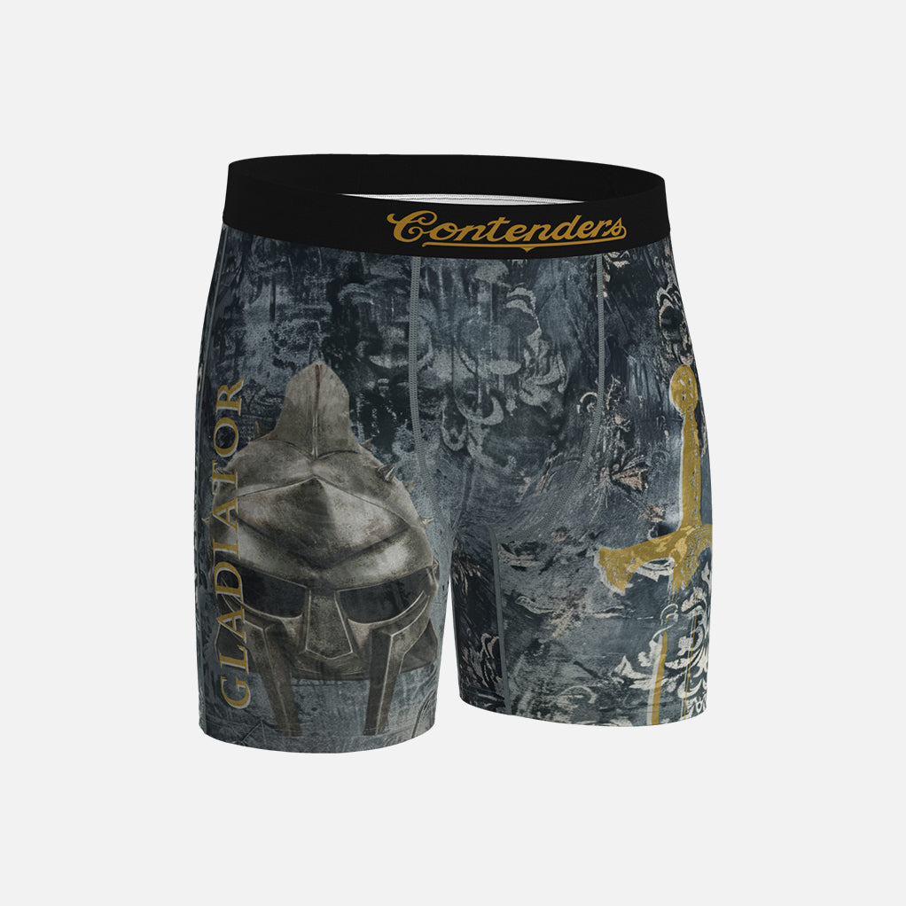 Gladiator Boxer briefs with warrior helmet and spear design on a gray background, featuring the brand 'Contenders'.