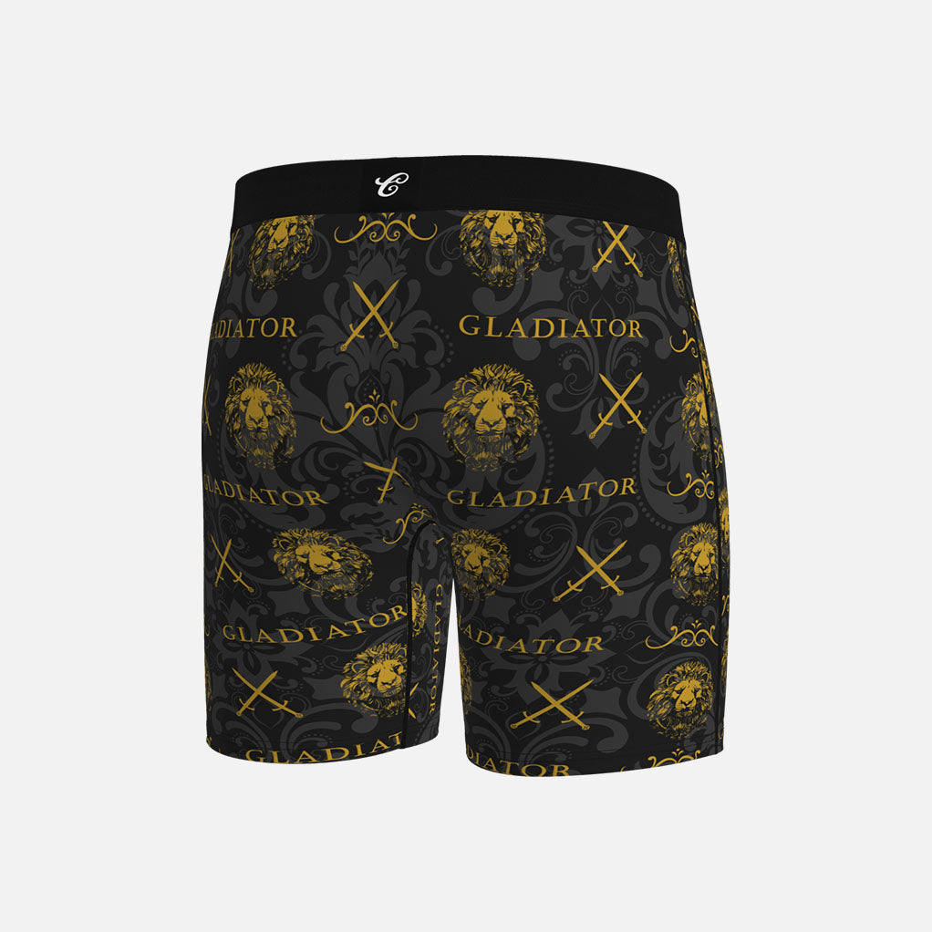 Black boxer briefs with gold &#39;Gladiator&#39; and &#39;Contenders&#39; branding on a light gray background