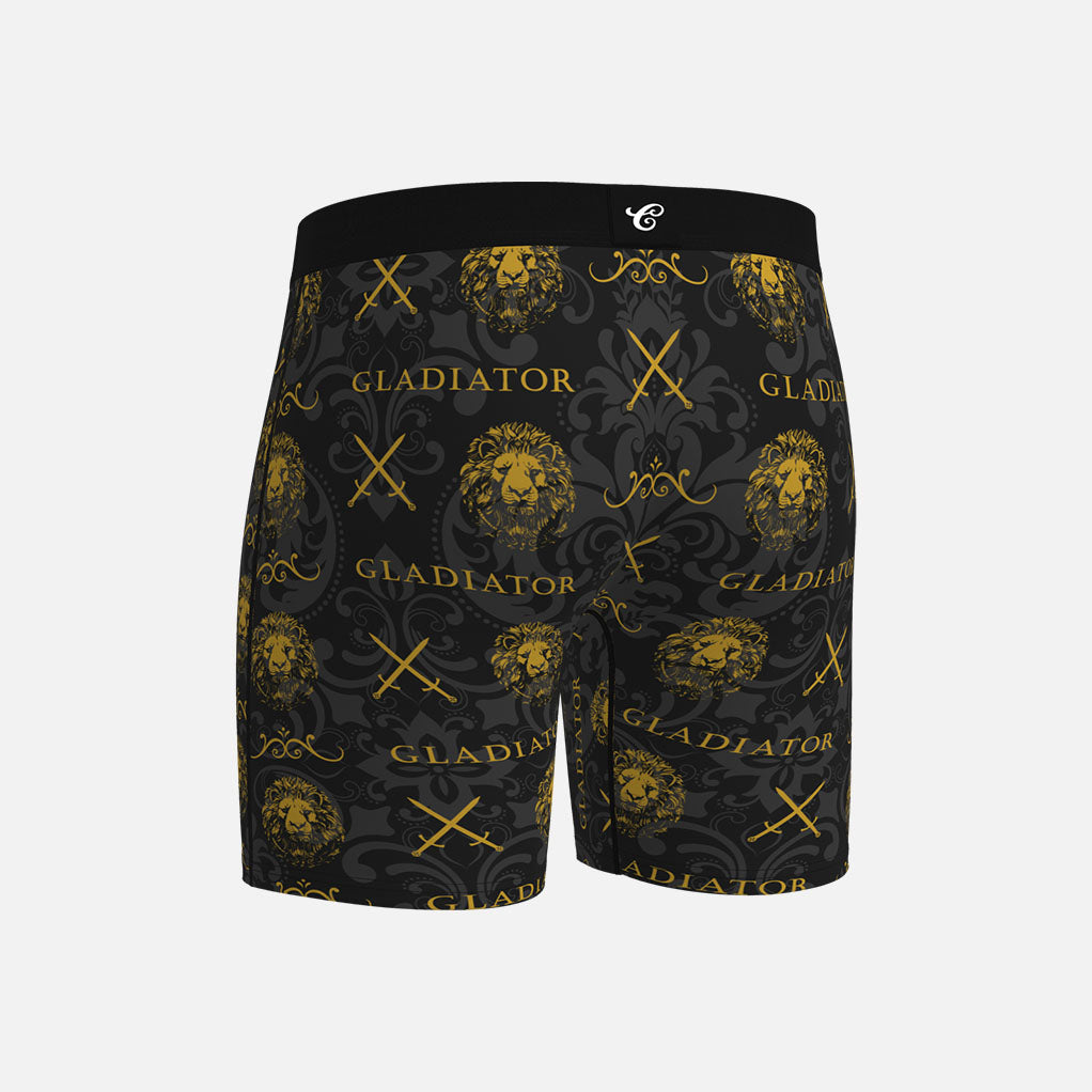 Black boxer briefs with gold &#39;Gladiator&#39; and &#39;Contenders&#39; branding on a light gray background