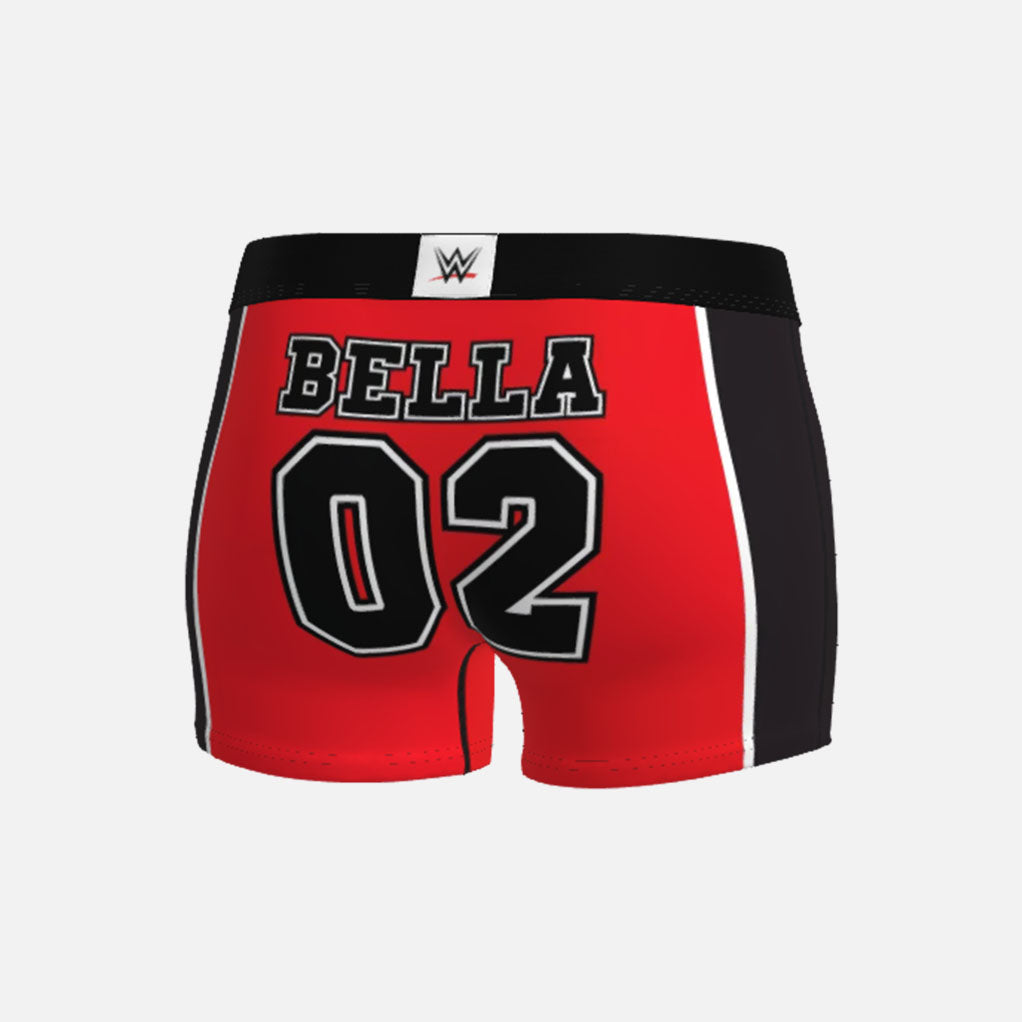 Red athletic shorts with black waistband featuring WWE Nikki Bella branding on a white background