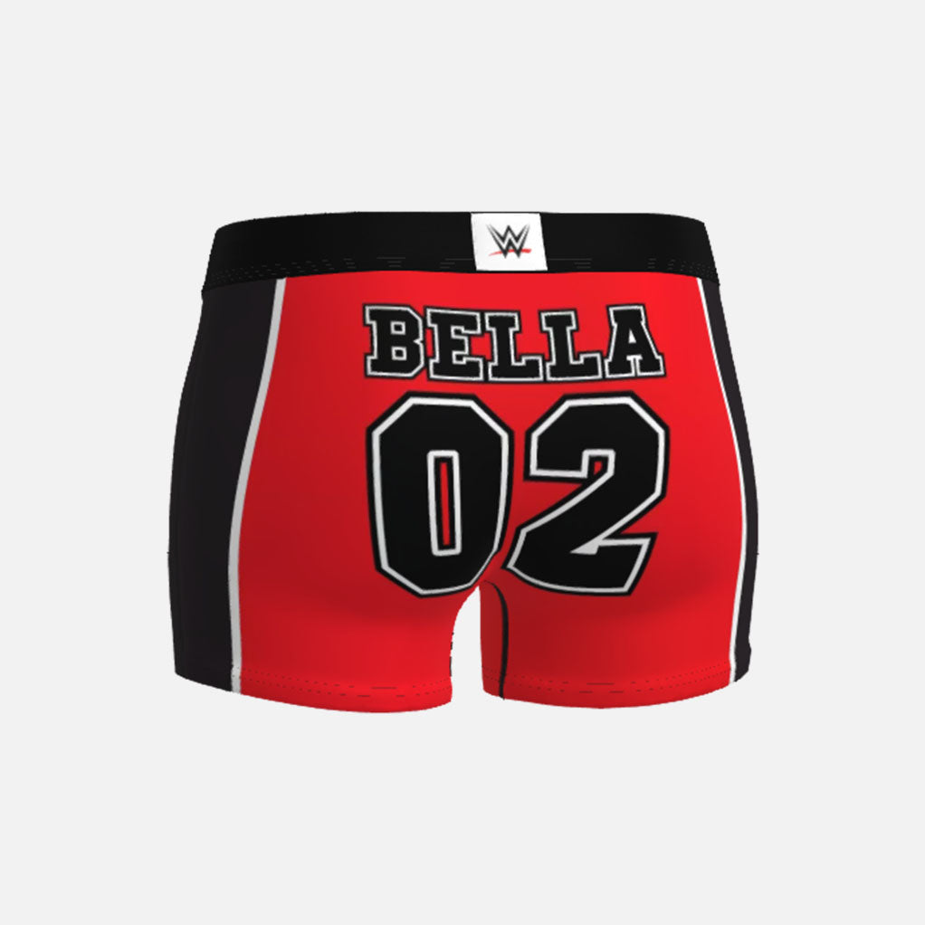 Red athletic shorts with black waistband featuring WWE Nikki Bella branding on a white background