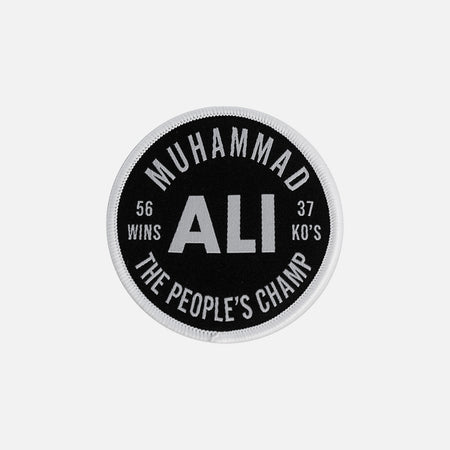 Round patch with Muhammad Ali's name and statistics on a white background